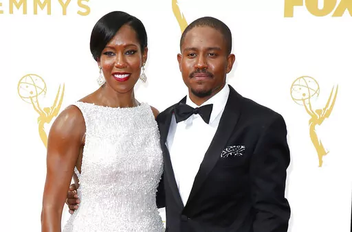 Regina King, left, and Ian Alexander Jr. arrive at the 67th Primetime Emmy Awards on Sunday, Sept. 20, 2015, at the Microsoft Theater in Los Angeles. Ian Alexander Jr., the only child of award-winning actor and director Regina King, has died.  The death was confirmed Saturday, Jan. 22,2022 in a family statement. (Photo by Danny Moloshok/Invision for the Television Academy/AP Images, File)