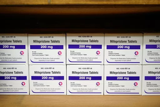 Boxes of the drug mifepristone line a shelf at the West Alabama Women's Center in Tuscaloosa, Ala., on Wednesday, March 16, 2022. The drug is one of two used together in "medication abortions."   On Friday, June 17,  The Associated Press reported on stories circulating online incorrectly claiming medication abortions are dangerous.  (AP Photo/Allen G. Breed, File)