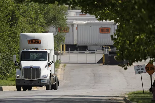 Yellow Corp. trucks are seen at a YRC Freight terminal Friday, July 28, 2023, in Kansas City, Mo. After years of financial struggles, Yellow is reportedly preparing for bankruptcy and seeing customers leave in large numbers — heightening risk for future liquidation. While no official decision has been announced by the company, the prospect of bankruptcy has renewed attention around Yellow's ongoing negotiations with unionized workers, a $700 million pandemic-era loan from the government and ot