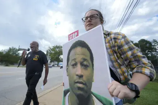 Rev. Hillary Taylor protests the planned execution of Freddie Eugene Owens, 46, on Friday, Sept. 20, 2024, in Columbia, S.C. Owens is set to be the first person to be executed in South Carolina in 13 years. (AP Photo/Chris Carlson)