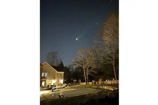 This photo provided by Brian Glenn shows what appears to be multiple drones flying over Bernardsville, N.J., on Thursday, Dec. 5, 2024 (Brian Glenn/TMX via AP, File)