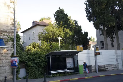 The home of U.S. Ambassador to Israel Tom Nides sits between two taller buildings on the main road of the German Colony neighbourhood of Jerusalem, Thursday, June 16, 2022. The official residence of the American envoy is a rental and temporary, officials said, secured after two years of house-hunting in the wake of then-President Donald Trump’s controversial decision to move the U.S. embassy from Tel Aviv to Jerusalem. (AP Photo/Maya Alleruzzo)