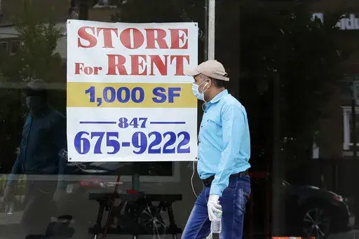 A Store For Rent sign is displayed at a retail property in Chicago, on June 20, 2020. As much as 20% of a federal pandemic relief program intended to help small businesses weather the COVID-19 outbreak is believed to have gone to fraudsters, while some 1.6 million applications for the loans may have been approved without even being evaluated. The program overseen by the U.S. Small Business Administration is one of the key targets of a Tuesday, June 14, 2022, congressional hearing that is expecte