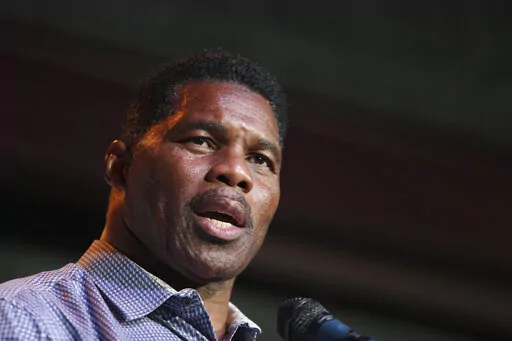 Herschel Walker, GOP candidate for the US Senate for Georgia, speaks at a primary watch party May 23, 2022, at the Foundry restaurant in Athens, Ga. Senate candidate Herschel Walker said Saturday, June 18, that he “never denied" the existence of children he had not previously disclosed publicly, telling conservative Christians that “they knew the truth.” (AP Photo/Akili-Casundria Ramsess, File)