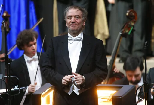 In this Wednesday, May 1, 2013 photo, Valery Gergiev, looks on after a "pre-premiere" performance, put on for veterans and senior employees of the theatre in the new Mariinsky Theatre on the eve of the it's official opening in St.Petersburg, Russia.  Gergiev, a conductor who is close to Russia President Vladimir Putin, will not lead the Vienna Philharmonic in a five-concert U.S. tour that starts at Carnegie Hall on Friday night. The 68-year-old Russian conductor is music director of the Mariinsk