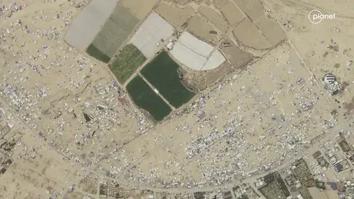 This satellite photo taken by Planet Labs PBC shows an evacuated camp in Rafah, Gaza, May 8, 2024. (Planet Labs PBC via AP)
