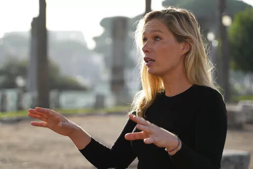 Laura Hart, campaign director of Safeguard Defenders is interviewed by the Associated Press in Rome, Thursday, Oct. 27, 2022. China has reportedly established dozens of “overseas police stations” in nations around the world that activists fear could be used to track and harass dissidents as part of Beijing’s crackdown on corruption. Spanish-based non-government group Safeguard Defenders published a report last month called “110 Overseas. Chinese Transnational Policing Gone Wild” that f