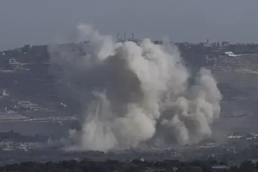 Smoke rises following an Israeli bombardment in southern Lebanon as seen from northern Israel, Friday, Oct. 4, 2024. (AP Photo/Baz Ratner)