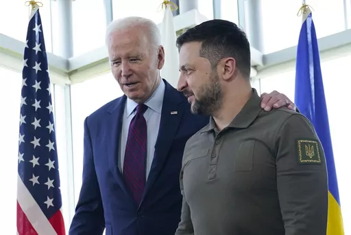 President Joe Biden, left, walks with Ukrainian President Volodymyr Zelenskyy ahead of a working session on Ukraine during the G7 Summit in Hiroshima, Japan, on May 21, 2023. Russia's war on Ukraine will top the agenda when U.S. President Joe Biden and his NATO counterparts meet in the Lithuanian capital Vilnius on Tuesday and Wednesday. (AP Photo/Susan Walsh, File)