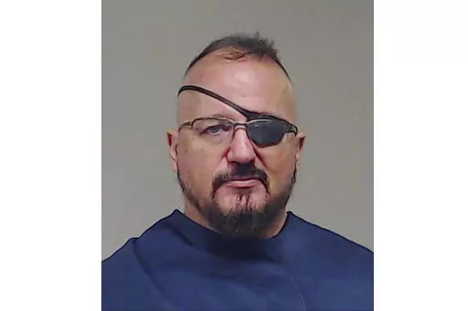 This photo, provided by the Collin County Sheriff's Office shows Stewart Rhodes. A federal judge refused on Friday, Feb. 18, 2022, to free Oath Keepers founder Rhodes from jail while he awaits trial on charges that he plotted with other members of his far-right militia group to attack the U.S. Capitol to stop Congress from certifying President Joe Biden's electoral victory. (Collin County Sheriff's Office via AP, File)