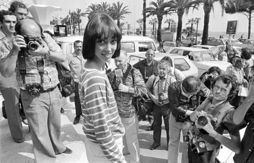 Shelley Duvall poses for photographers at the 30th Cannes Film Festival in France, May 27, 1977. Duvall, whose wide-eyed, winsome presence was a mainstay in the films of Robert Altman and who co-starred in Stanley Kubrick's “The Shining,” has died. She was 75. (AP Photo/Jean-Jacques Levy, File)