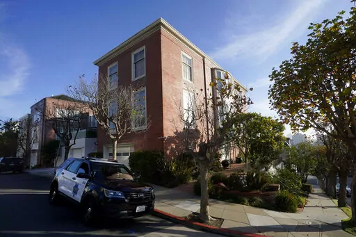 A San Francisco Police Department vehicle parks outside the home of Speaker of the House Nancy Pelosi, in San Francisco, Saturday, Oct. 29, 2022.  On Friday, Nov. 4, The Associated Press reported on stories circulating online incorrectly claiming the attack on Paul Pelosi was a “Domestic Violence Case in a consensual sexual relationship." (AP Photo/Jeff Chiu, File)
