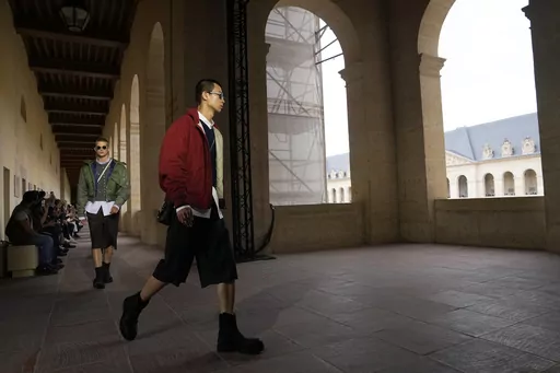 Models wear creations for Givenchy Menswear Spring/Summer 2024 fashion collection presented in Paris, Thursday, June 22, 2023. (AP Photo/Michel Euler)
