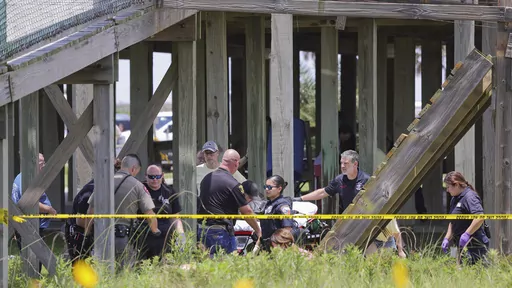 An elevated walkway collapsed an injured several members of a visiting youth group at Stahlman Park in Surfside Beach, Texas, Thursday, Jun. 8, 2023. Nearly two dozen teenagers from a summer camp were injured when an elevated walkway collapsed Thursday in the beachside city in Texas, with five flown to the hospital by helicopter. (Mike Felix/The Brazosport Facts via AP)