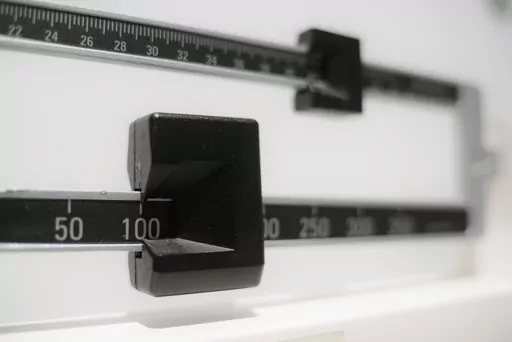 This Tuesday, April 3, 2018 file photo shows a closeup of a beam scale in New York. High-dose oral versions of the medication in the weight-loss drug Wegovy may work as well as injections at paring pounds and improving health, including hard-to-treat people with diabetes, according to research released Sunday, June 25, 2023. (AP Photo/Patrick Sison, File)