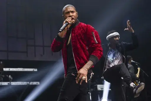 Usher performs at Power 105.1's Powerhouse 2016 at Barclays Center in New York on Oct. 27, 2016. He was added to the lineup for the Essence Festival of Culture, which runs July 4-7 in New Orleans. (Photo by Scott Roth/Invision/AP, File)