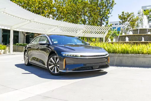 This photo provided by Edmunds shows the 2022 Lucid Air, a luxury electric sedan with an EPA-estimated range of up to 520 miles. (Rex Tokeshi-Torres/Edmunds.com via AP)