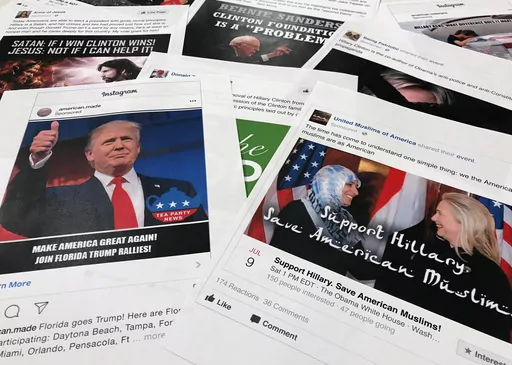 Printouts of some of the Facebook and Instagram ads linked to a Russian effort to disrupt the American political process and stir up tensions around divisive social issues, released by members of the U.S. House Intelligence committee, photographed in Washington, are photographed on Nov. 1, 2017. Federal prosecutors and lawyers for Donald Trump have signaled their desire to invoke the 2016 election in the former president's trial on charges of scheming to overturn the results of the 2020 presiden