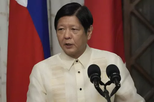 Philippine President Ferdinand Marcos Jr. talks beside Japanese Prime Minister Fumio Kishida, not shown, during their joint statement at the Malacanang presidential palace in Manila, Philippines on Nov. 3, 2023. Dozens of Filipinos fled from the war-ravaged Gaza Strip into Egypt through the Rafah crossing after Filipino diplomats negotiated for their safe passage and Qatar mediated for the border to be opened, Marcos said Wednesday, Nov. 8. (AP Photo/Aaron Favila, Pool, File)
