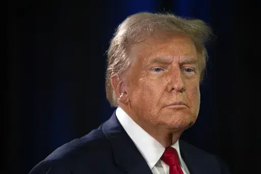 Republican presidential nominee former President Donald Trump speaks to reporters in the spin room after a presidential debate with Democratic presidential nominee Vice President Kamala Harris, Tuesday, Sept. 10, 2024, in Philadelphia. (AP Photo/Matt Slocum)