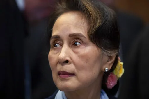 Myanmar's leader Aung San Suu Kyi waits to address judges of the International Court of Justice in The Hague, Netherlands, Dec. 11, 2019. A court in military-ruled Myanmar convicted former leader Aung San Suu Kyi in another criminal case Thursday, Sept. 29, 2022, and sentenced Australian economist Sean Turnell to three years in prison for violating an official secrets law, a legal official said. (AP Photo/Peter Dejong, File)