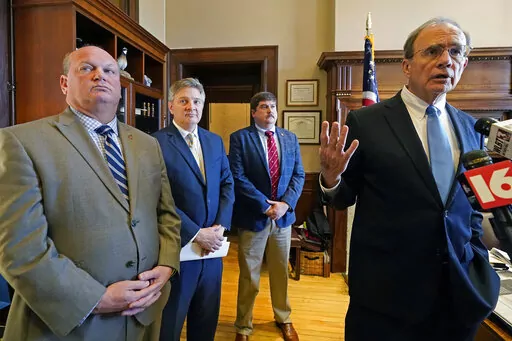 Republican Lt. Gov. Delbert Hosemann, right, speaks about proposed legislation that standardizes some sentencing for a number of crimes, including motor vehicle theft, fleeing law enforcement and resisting arrest, Thursday, Jan. 26, 2023, at the Mississippi Capitol in Jackson. Attending the briefing, were Senate Judiciary A Committee Chairman Brice Wiggins, R-Pascagoula, left, Senate Judiciary B Committee vice chairman Jeremy England, R-Vancleave, rear, and Senate Judiciary B Committee chairman 