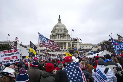 Insurrections loyal to President Donald Trump rally at the U.S. Capitol in Washington on Jan. 6, 2021. Ray Epps, an Arizona man who became the center of a conspiracy theory about Jan. 6, 2021, has been charged with a misdemeanor offense in connection with the U.S. Capitol riot, according to court papers filed Tuesday. Epps is charged with a single count of a disorderly or disruptive conduct on restricted grounds. (AP Photo/Jose Luis Magana, File)