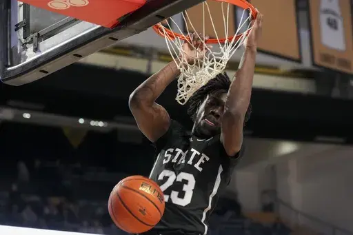Mississippi State center Michael Nwoko (23) dunks the ball during the first half of an NCAA college basketball game against Vanderbilt, Tuesday, Jan. 7, 2025 in Nashville, Tenn. (AP Photo/George Walker IV)