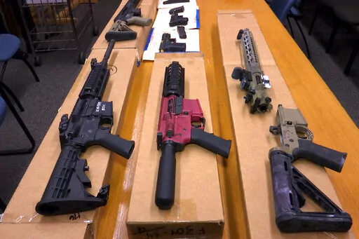 This Nov. 27, 2019, file photo shows "ghost guns" on display at the headquarters of the San Francisco Police Department in San Francisco. The Biden administration is expected to come out within days with its long-awaited ghost gun rule. The aim is to rein in privately made firearms without serial numbers. They're increasingly cropping up at crime scenes across the U.S. Three people familiar with the matter tell The Associated Press the rule could be released as soon as Monday, April 11,2022. The
