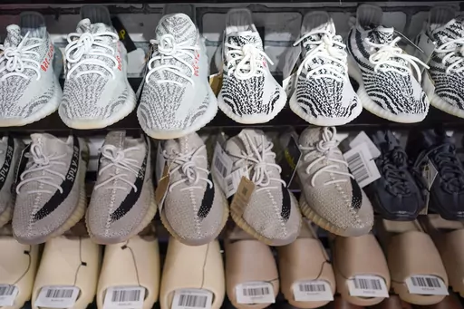 Yeezy shoes made by Adidas are displayed at Laced Up, a sneaker resale store, in Paramus, N.J., Tuesday, Oct. 25, 2022. Some of Adidas' remaining Yeezy shoes are back on sale, Wednesday, May 31, 2023, months after the German sportsware company cut ties with Ye, the rapper formerly known as Kanye West. (AP Photo/Seth Wenig)