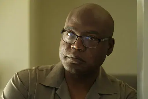 Terrence Hersey stands for a portrait at his home Friday, June 17, 2022, in South Holland, Ill. Hersey underwent extensive rehabilitation for a stroke in 2015, before his doctors eventually cleared him to return to work in 2016. But Union Pacific decided without ever having a doctor examine him that the stroke made him unfit to work for the railroad. Union Pacific has already lost three lawsuits over the way it dismisses employees with health conditions because of safety concerns, and the prospe
