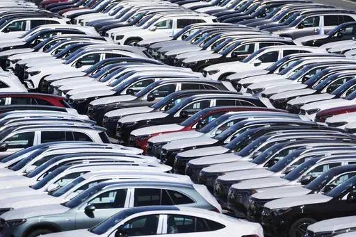 Vehicles are seen at the Mercedes-Benz Vehicle Preparation Center at the Port of Baltimore, where new Mercedes-Benz vehicle imports are processed before distribution to dealerships, Thursday, March 27, 2025, in Baltimore. (AP Photo/Stephanie Scarbrough)