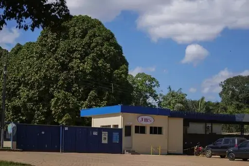 The main entrance of the meat processing company JBS is visible in Porto Velho, Rondonia state, Brazil, Wednesday, July 12, 2023. Some lawmakers and environmental groups are opposed to JBS being listed on the New York Stock Exchange, arguing that expanded capital would allow the company, responsible for much deforestation in the Amazon rainforest, to do even more harm. (AP Photo/Andre Penner, File)