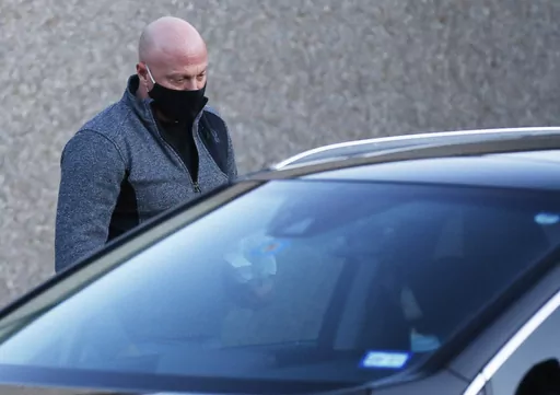 Retired Air Force officer Larry Rendall Brock Jr. walks out of Parker County Jail upon release on Jan. 14, 2021, in Weatherford, Texas. Brock, who stormed the U.S. Capitol dressed in combat gear and carried zip-tie handcuffs into the Senate gallery, was sentenced to two years in prison on Friday, March 17, 2023. Brock joined other rioters on the Senate floor only minutes after then-Vice President Mike Pence, senators and their staff evacuated the chamber to escape the mob attacking the building 