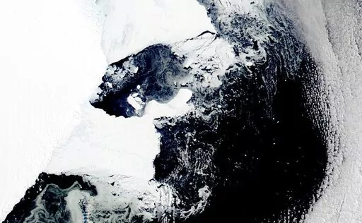This satellite image provided by NASA, Aqua MODIS 12 on March 2022  shows the main piece of C-37 close to Bowman Island.  Scientists are concerned because an ice shelf the size of New York City collapsed in East Antarctica, an area that had long been thought to be stable. The collapse last week was the first time scientists have ever seen an ice shelf collapse in this cold area of Antarctica. (NASA via AP)