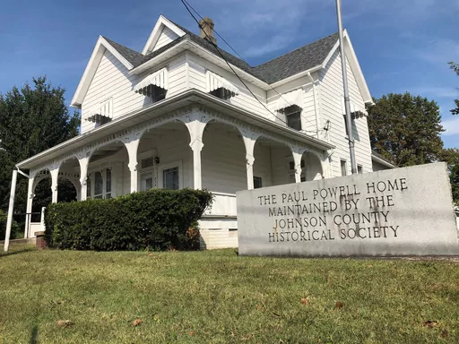 A sign marks he Paul Powell Home and Museum, Oct. 8, 2020 photo in Vienna, Ill. For more than half a century, a Powell-established $250,000 trust sustained his legacy, for better or worse. But the account that maintained his birthplace as a museum will soon run dry. (AP Photo/John O'Connor, File)