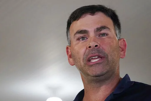 Republican Secretary of State Michael Watson addresses the crowd at the pavilion in Founders Square at the Neshoba County Fair in Philadelphia, Miss., July 28, 2022. Watson filed qualifying papers on Wednesday, Jan. 25, 2023, to seek a second term as Mississippi's top elections official. (AP Photo/Rogelio V. Solis, File)