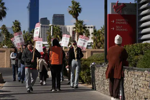 Members of the Culinary Workers Union picket in front of the Virgin Hotels Las Vegas, Friday, Nov. 15, 2024, in Las Vegas. (AP Photo/John Locher)
