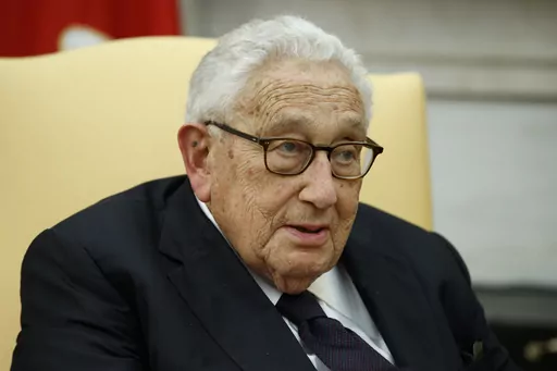 Former Secretary of State Henry Kissinger speaks during a meeting with President Donald Trump in the Oval Office of the White House, Tuesday, Oct. 10, 2017, in Washington. Kissinger marks his 100th birthday on Saturday, May 27, 2023, outlasting many of his political contemporaries who guided the United States through one of its most tumultuous periods including the presidency of Richard Nixon and the Vietnam War. (AP Photo/Evan Vucci, File)