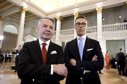 Leaders after the early vote results, National Coalition Party candidate Alexander Stubb, right, and Social Movement candidate Pekka Haavisto stand during the Presidential election event, at the Helsinki City Hall, in Helsinki, Finland, Sunday, Jan. 28, 2024. Finns on Sunday, Feb. 11, 2024 will pick a new head of state from the array of two experienced politicians whose main will be to steer the Nordic country’s foreign and security policy at an unprecedented time when the country is now a NAT
