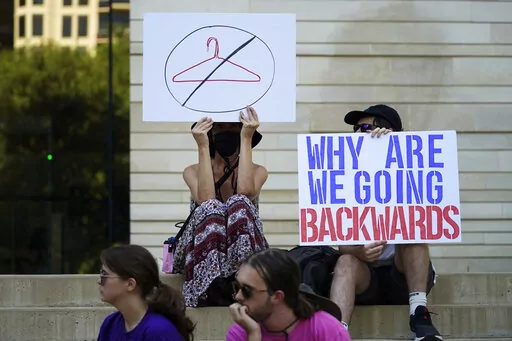 Demonstrators gather at the federal courthouse following the Supreme Court's decision to overturn Roe v. Wade, June 24, 2022, in Austin, Texas. Some opponents of the decision are feeling despair over the historic rollback of the 1973 case Roe V. Wade legalizing abortion. If a right so central to the overall fight for women’s equality can be revoked, they ask, what does it mean for the progress women have made in public life in the intervening 50 years? (AP Photo/Eric Gay, File)