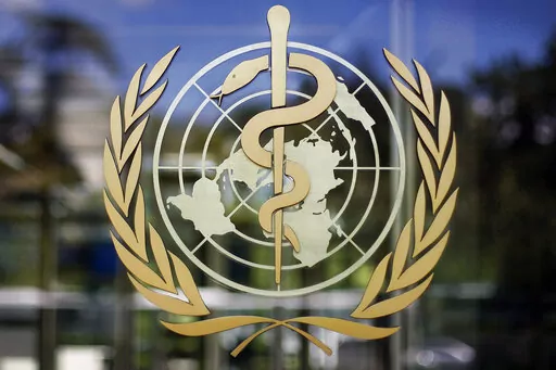The logo of the World Health Organization is seen at the WHO headquarters in Geneva, Switzerland, June 11, 2009. The World Health Organization chief on Tuesday, Feb. 1, 2022 says 90 million cases of coronavirus have been reported since the omicron variant was first identified 10 weeks ago, amounting to more than in all of 2020, the first year of the COVID-19 pandemic. (AP Photo/Anja Niedringhaus, File)
