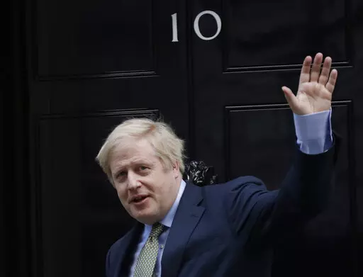 Britain's Prime Minister Boris Johnson returns to 10 Downing Street after meeting with Queen Elizabeth II at Buckingham Palace, London, Dec. 13, 2019. Boris Johnson’s bluster couldn’t hide the facts: He didn’t have the votes to win the Conservative Party leadership contest and stage a political comeback just weeks after being forced out as prime minister. (AP Photo/Matt Dunham, File)