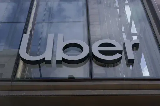 An Uber sign is displayed at the company's headquarters in San Francisco, Sept. 12, 2022. (AP Photo/Jeff Chiu, File)