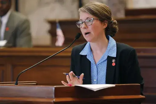 Senate Elections Committee Chair Jenifer Branning, R-Philadelphia, explains a facet of an absentee-ballot bill during floor debate at the Capitol in Jackson, Miss., June 15, 2020. (AP Photo/Rogelio V. Solis, File)