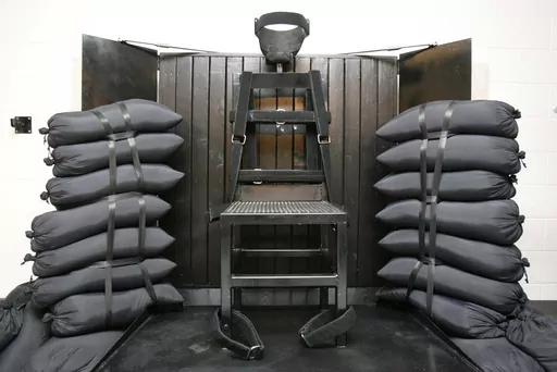 A chair sits in the execution chamber at the Utah State Prison on June 18, 2010, after Ronnie Lee Gardner was executed by firing squad in Draper, Utah. Idaho lawmakers passed a bill on March 20, 2023, that would authorize the use of firing squads if the state is unable to obtain drugs required for its lethal injection program. The bill will head to the desk of Idaho Gov. Brad Little next. (Trent Nelson/The Salt Lake Tribune via AP, Pool, File)