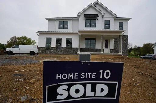 A home under construction at a development in Eagleville, Pa., is shown on Friday, April 28, 2023. Rates on credit cards, mortgages and auto loans, which have been surging since the Fed began raising rates last year, all stand to rise even more. (AP Photo/Matt Rourke)