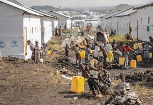 People displaced by the ongoing fighting between Congolese forces and M23 rebels gather in a camp on the outskirts of Goma, Democratic Republic of Congo, Wednesday, March 13, 2024, Ramesh Rajasingham, OCHA (United Nations Office for the Coordination of Humanitarian Affairs) head and representative is carrying out a working visit to the region. (AP Photo/Moses Sawasawa)