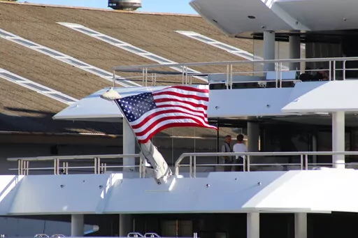 The superyacht Amadea is moored in Honolulu on Thursday, June 16, 2022. A Russian-owned superyacht seized by the United States arrived in Honolulu Harbor flying a U.S. flag after the U.S. last week won a legal battle in Fiji to take the $325 million vessel. (AP Photo/Audrey McAvoy)