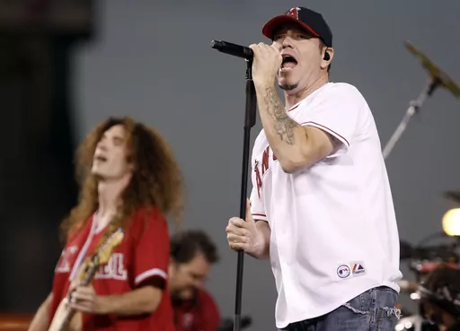 In this Sept. 29, 2008 file photo, Singer Steve Harwell, of Smash Mouth, performs with the band in Anaheim, Calif. Harwell, the longtime frontman of the Grammy-nominated pop rock band Smash Mouth, has died. He was 56. The band’s manager, Robert Hayes, says Harwell “passed peacefully and comfortably” on Monday morning, Sept. 4, 2023 surrounded by family and friends at his home in Boise, Idaho. (AP Photo/Matt Sayles, File)